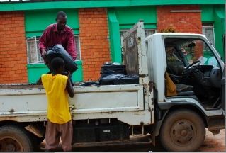 Family members volunteer loading the 65 boxes of books into the 5 ton truck in Lusaka before the 400 mile drive.
